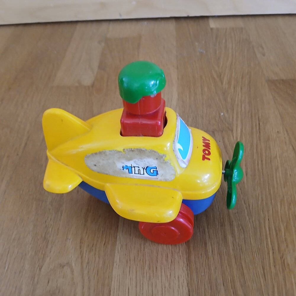 Tomy Airplane Pull and Go Toys used